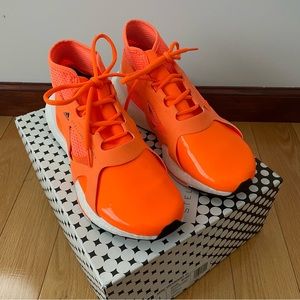 Adidas by Stella McCartney Ultraboost 21 in signal orange/core white. Size 8.5